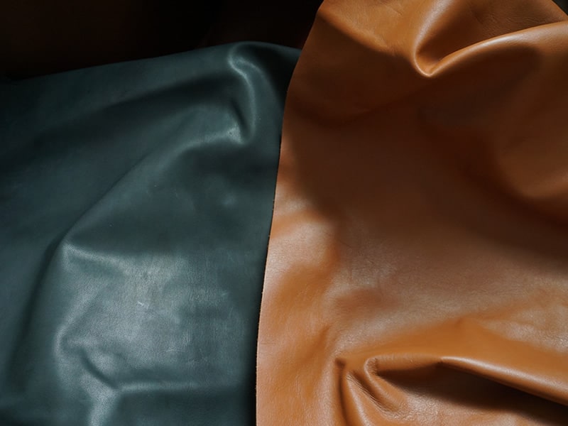 Vera Pelle in colore nero e marrone lucido